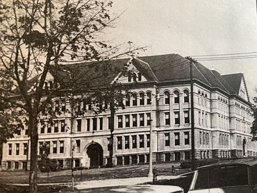 A black and white photo of the Holyoke Graduate School building.
