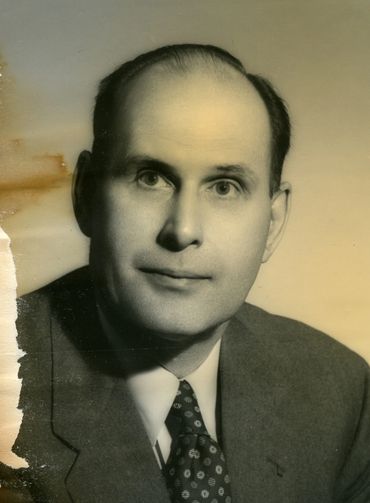A studio portrait of a young George Frost