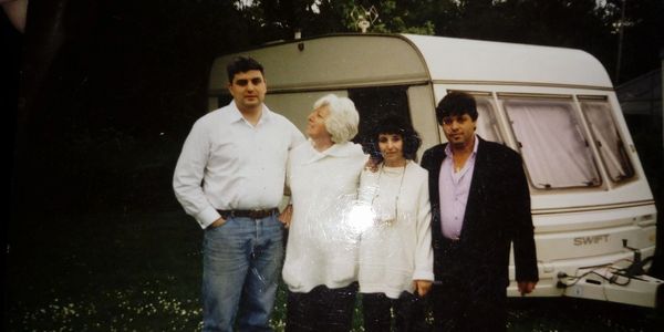 Peter Gourri with his mother Pauline Gourri and other family members in the mid 1990's. 