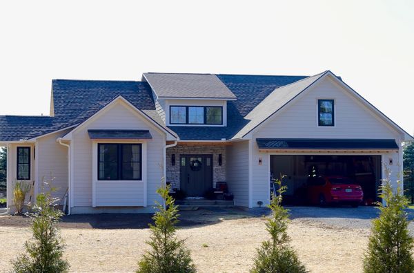 New lawn installation and a arborvitae trees