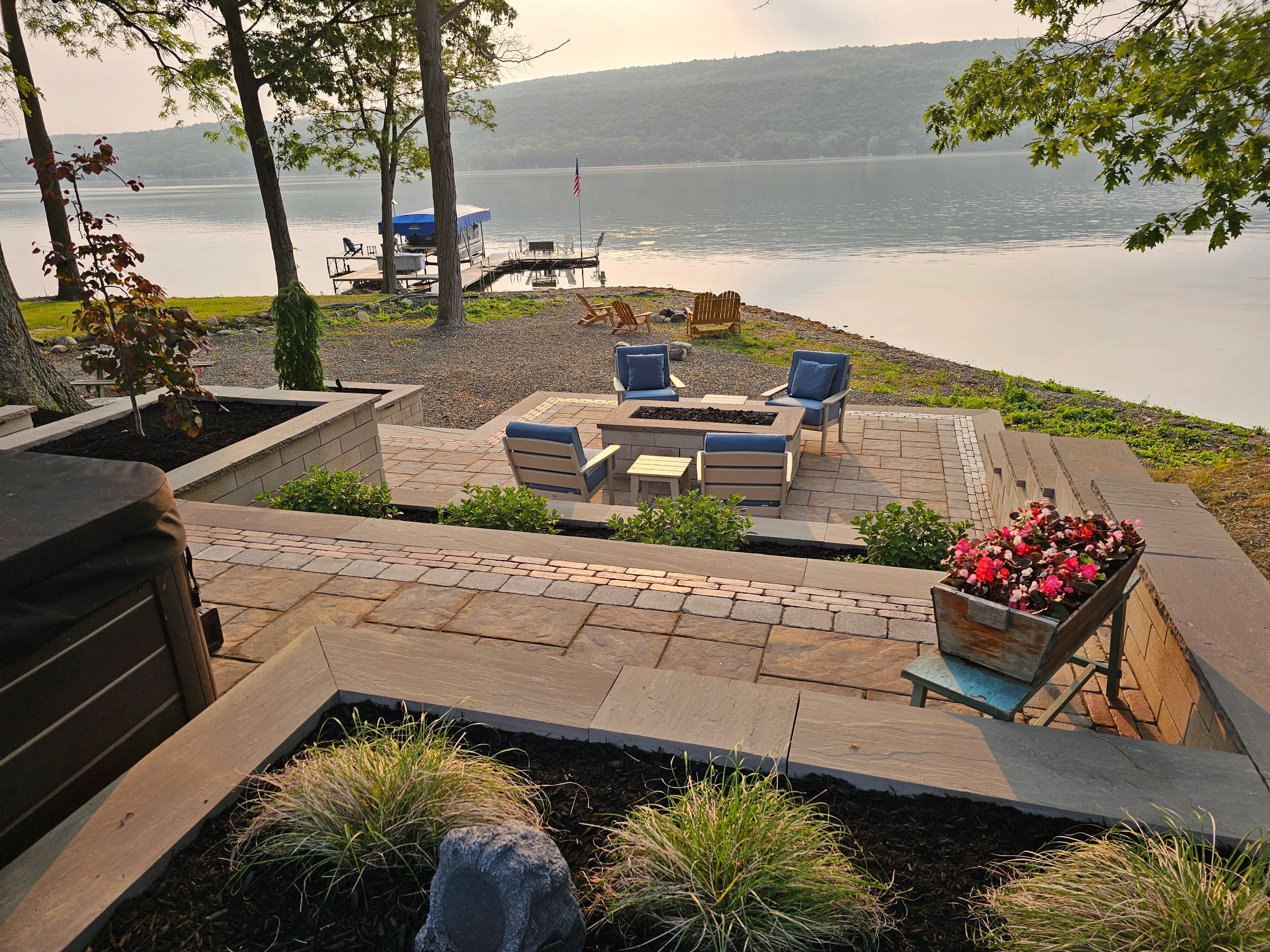 A great landscape design creates functional outdoor living spaces, hardscape, and fine gardening.  