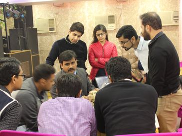 group of dentist having case discussion at delhi dental course