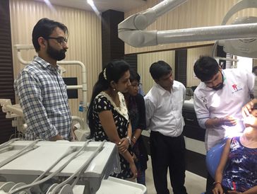 group of dentist taking demo at delhi dental course