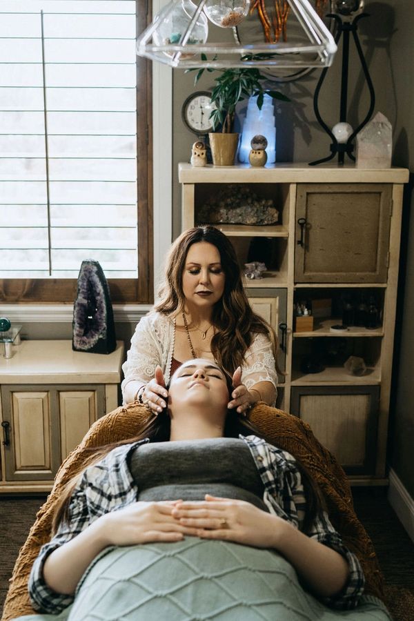 reiki energy work on client to restore balance and health