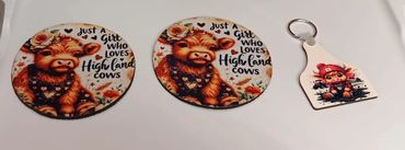 Round coffee coasters and cow keychain.