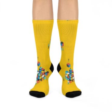 Yellow socks with colorful cube patterns and black heels.