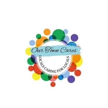 A colorful circular logo with the text 'Our Town Cares' and 'Locals Caring for Locals'.