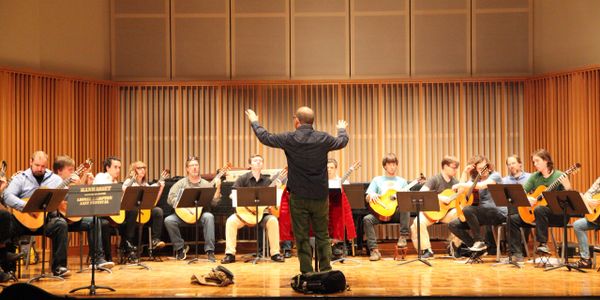 Directing the festival Guitar Orchestra at the 25th annual Northwest Guitar Festival.