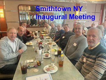 Group of men gathered at a restaurant for Smithtown NY inaugural meeting.
