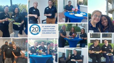 VI Aventura's 20th anniversary celebration with staff enjoying food and camaraderie.