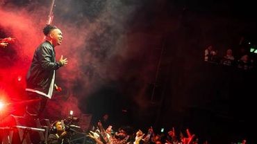 Performer engaging concert audience