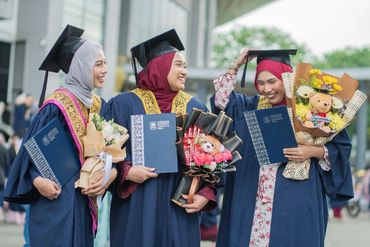 Parents celebrating graduation achievement