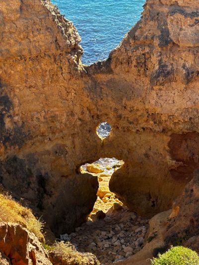 Natural rock formation with sea view.