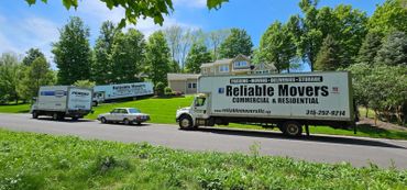 Three moving truck local move in Manlius completed by Reliable Movers