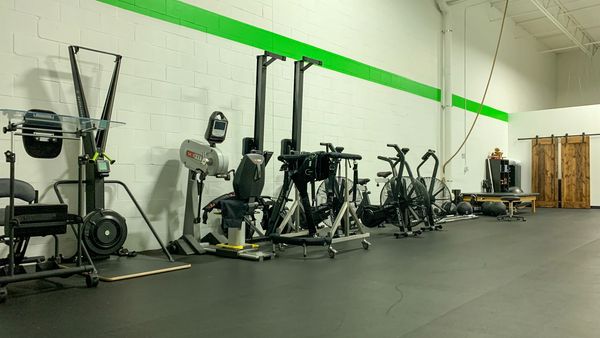 Our accessible clinic space with specialized rehab and traditional gym equipment.