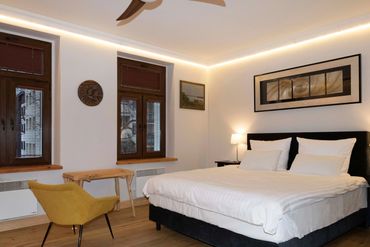 main bedroom with hotel king size bed