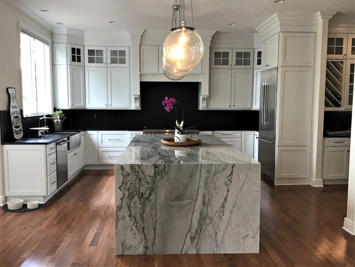 modern white kitchen with waterfall stone island - Pittsburgh. PA - bespoke kitchens and baths