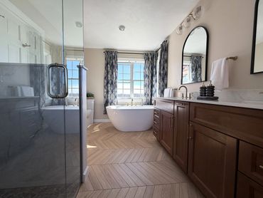 Luxury Bathroom renovation, featuring walk-in shower, soaking tub and vanity with storage and groomi