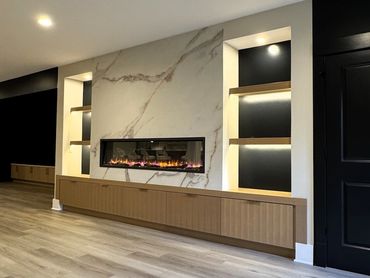 modern stone fireplace wall - basement entertaining space - pittsburgh basement finishing