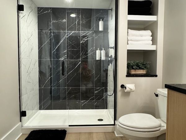 black tile walk in shower - pittsburgh pa bathroom remodeling