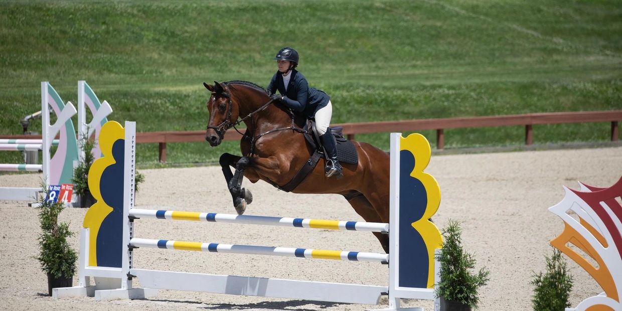 Cassie Beighle jumping at an event