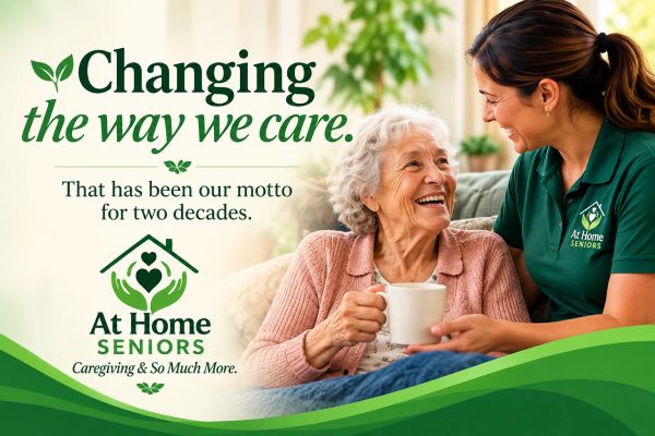 Caregiver attentively assisting a smiling elderly woman at home.