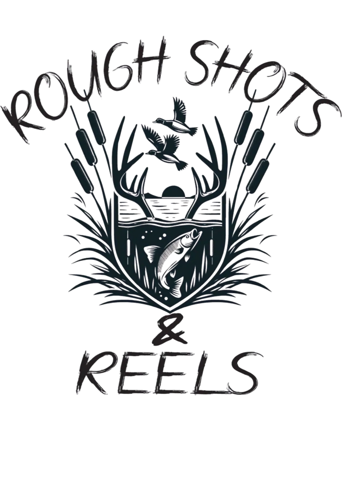 Two men in matching Rough Shots & Reels shirts leaning on a white truck under green trees.