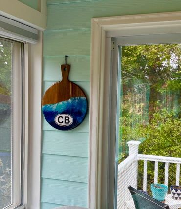 Wall display, serving board or flip it over as a cutting board.