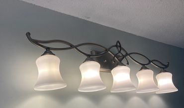 a group of lights that are on a wall