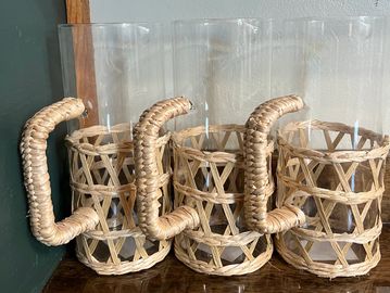3 glass pitchers with raffia