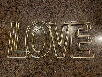 Gold love sign