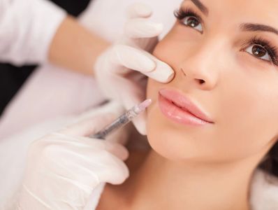 A patient getting botox or lip fillers