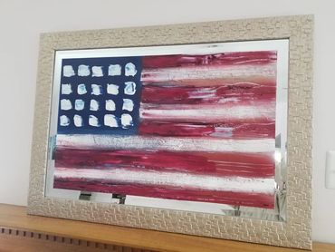 Acrylic mixed media on mirror.