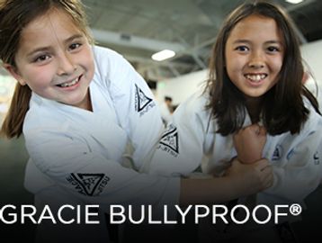 Kids learning how to defend against bullies through the martial art of Brazilian Jiu-Jitsu