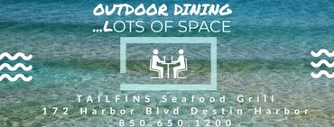 “Lunch specials:  Outdoor dining with harbor views at Tailfins Waterfront Grill in Destin”
