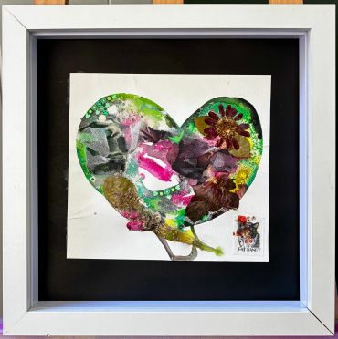 Framed mixed media heart artwork with flowers and fabric textures.