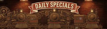 Vintage trains with Daily Specials banner on brick wall.