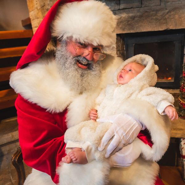 Santa Claus at a Christmas event as Holiday entertainment