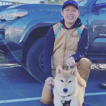 Jonathan Wong with a shiba inu