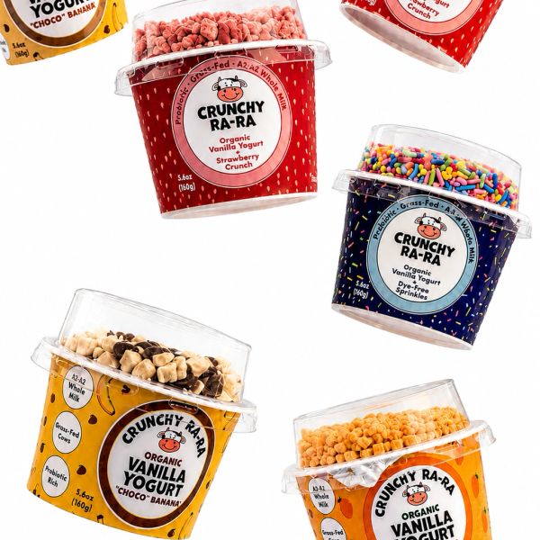 Various flavors of Crunchy Ra-Ra organic vanilla yogurt with toppings.