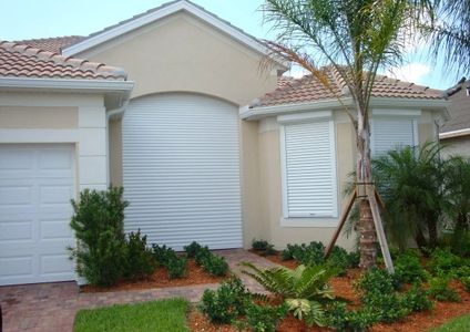 Fully protected home with rolling hurricane shutters