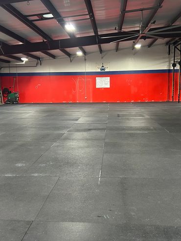 JetEngineCrossFit gym facility, spacious and fully equipped for high-intensity training.