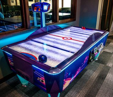 Photo of air hockey arcade game