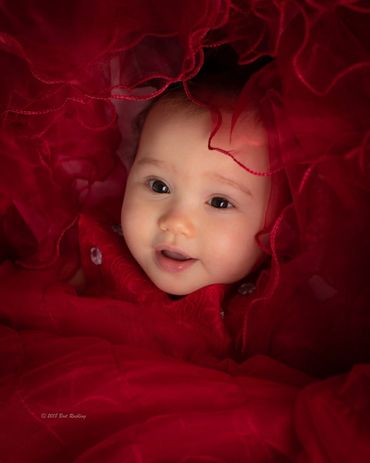 A baby in red