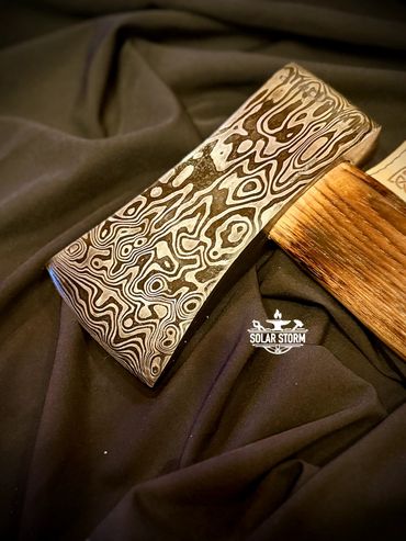Custom Damascus Axe close up by Bob Bryenton Alberta Bladesmith