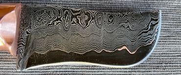 cumai damascus skinning knife custom filework on spine blade highlight