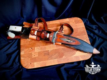CuMai damascus Kopis sword by Custom bladesmith in Alberta Canada in scabbard and sheath