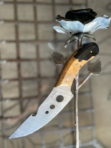 ladder pattern damascus chefs knife black handle version