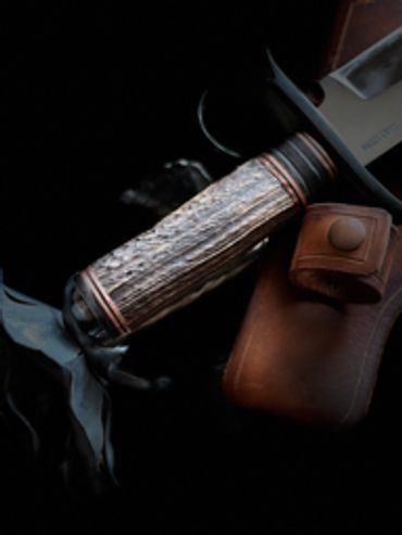 handle detail Take down Bowie blade with ring guard elk antler handle. Cross draw and traditional ca