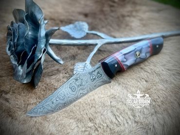 Damascus Bowie from Bladesmith in Alberta Canada left view